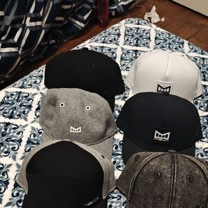 Melin Brand Black, Gray, and White Hats